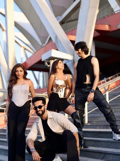 This candid moment from the 'Campus Beats' shoot captures genuine interaction between the cast, adding a layer of authenticity to the promotional photos.