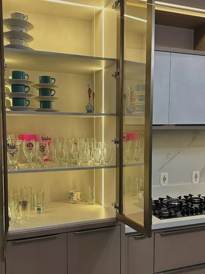 Internal cabinet lighting not only looks beautiful but is also highly functional. This illuminated glass crockery unit turns your glassware into a stunning display piece.