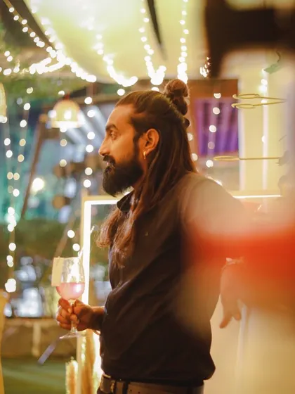 Taking a moment to enjoy the ambiance. It's important to feel the vibe of the party to know how to elevate it.