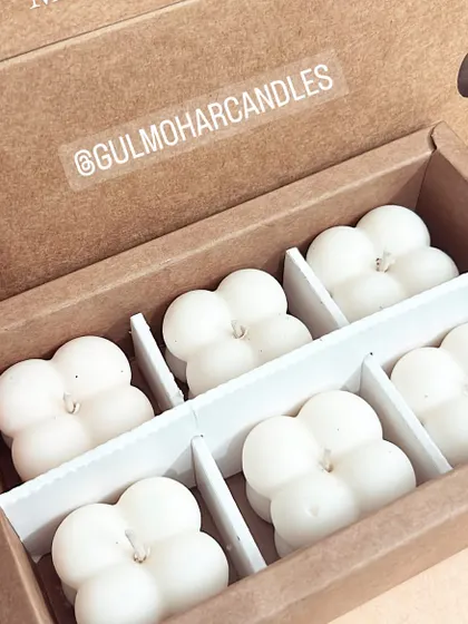 A box of six mini bubble candles, perfect for corporate or Diwali bulk gifting. The box can be customized with a company logo.