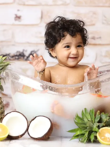 Another take on our popular fruit bath, this time with tropical pineapples and coconuts. We love creating these custom setups to match a bright and sunny personality.