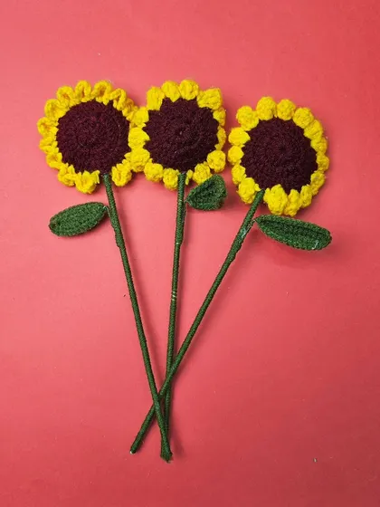 Brighten up any gift with our cheerful crochet sunflowers. These handcrafted flowers are a wonderful addition to our hampers, bringing a little bit of sunshine to someone's day.