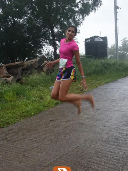 A celebratory jump after the race. Running brings out the child in me, and it is all about finding that joy.