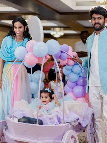 The birthday girl makes a grand entrance in a custom-made carriage at her pastel-themed party.