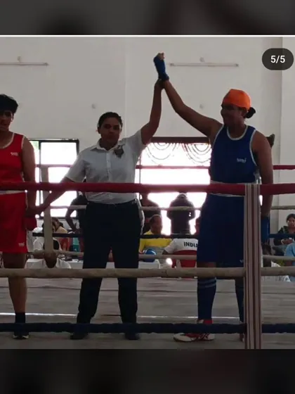 A win in the ring at the Youth Women State Championship in Nagpur. This is the moment all the training pays off, getting your hand raised as the winner.