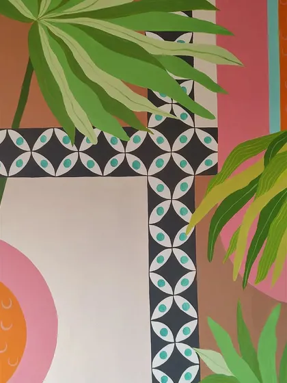 A close-up of the geometric tile pattern used as a border, which contrasts beautifully with the organic shapes of the leaves.