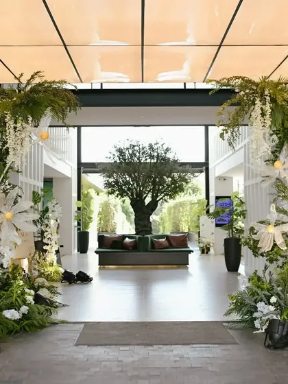 The grand entrance to the wedding venue, beautifully decorated by our team.