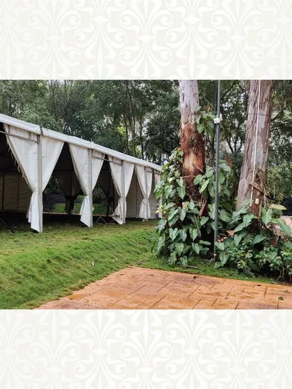 An outdoor tent setup for a vintage-themed event, showing how I prepare the basic structure before transforming it with lights, drapes, and decor.