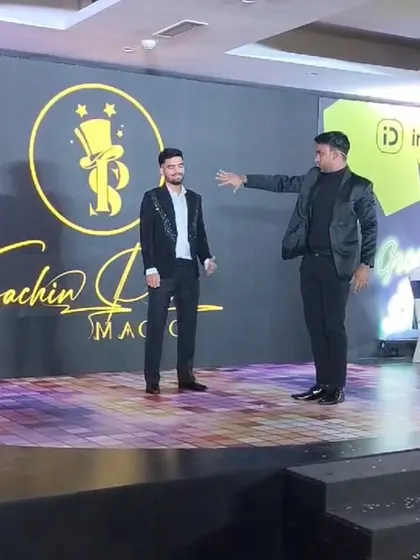 Guiding a volunteer through a mind-bending illusion on stage. My goal is to make them the star of the moment.