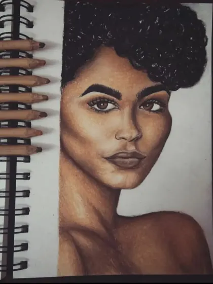 This is an example of a detailed pencil portrait sketch. Using various grades of colored pencils on paper, I focus on capturing delicate features and a lifelike expression. This classic style is perfect for a timeless and personal piece of art.