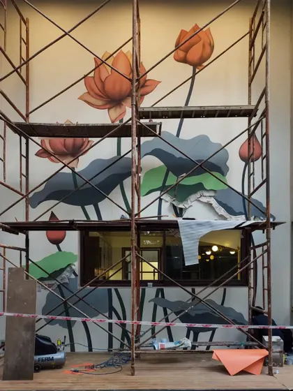 A work-in-progress shot of our residential lotus mural. The joy of mural making is in the layers, where we add subtlety and complexity to bring the flowers to life.
