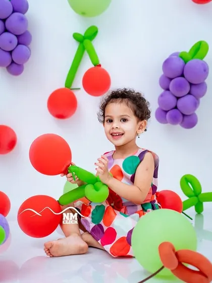 A "two-tti frutti" birthday. This summer fruit series with balloon art is a colorful and unique way to celebrate a birthday, perfect for a summer baby.