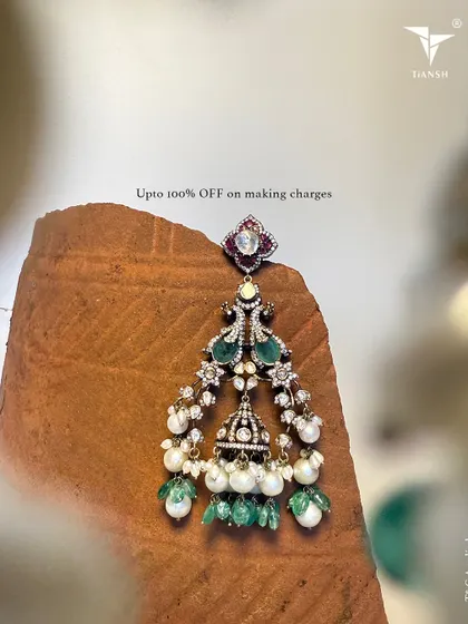 This Dhanteras, choose to treasure gold that holds meaning, stories, and grace. These chandelier earrings with emeralds and pearls are a perfect example.