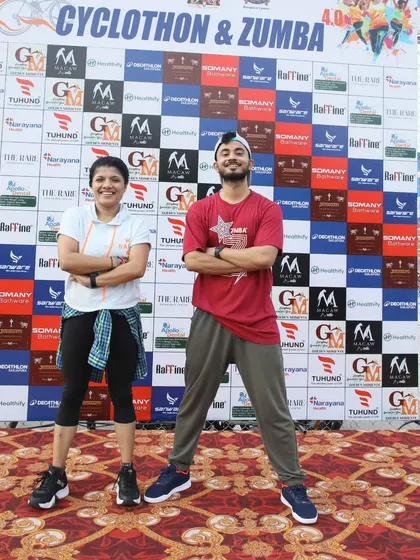 Posing with a fellow trainer at the Decathlon event. We often collaborate with other amazing instructors to deliver the best possible experience.