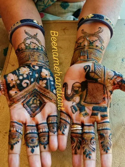 This design features beautiful peacocks and elephants, which are symbols of royalty and good fortune. The use of negative space makes the motifs pop.