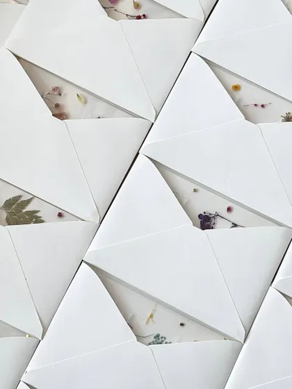 The finishing touches for the Adidas project. Each personalized certificate was enclosed in a subtly textured white envelope, carefully addressed with a brush pen, and sealed with a dark grey custom Adidas wax seal.