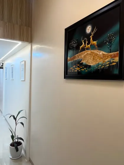 Our clinic's hallway is designed to be serene and welcoming, leading you towards your consultation and treatment rooms.
