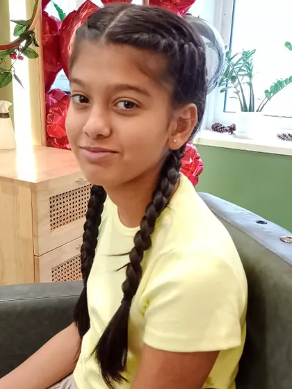 A close-up of the neat and intricate braids, a perfect hairstyle for school, parties, or any day.