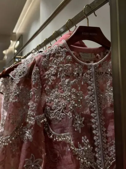 A close-up of the exquisite embroidery and pearl detailing on a Ridhi Mehra creation. Showcasing the craftsmanship of a collection is a key part of my event strategy for designer brands.