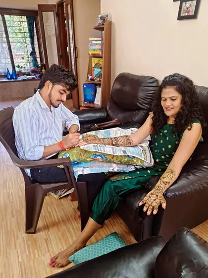 A comfortable home service session with a smiling client.