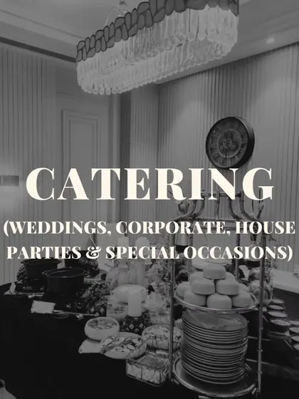 A black and white shot of one of our elegant buffet setups, highlighting the beautiful decor and sophisticated ambiance we create.