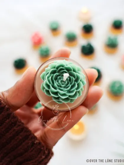 Holding one of the 'Desert Bloom' succulent tealights. The detail in the tiny petals is something I'm very proud of.