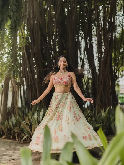 A beautiful, twirling shot that captures the carefree spirit of a Haldi ceremony. The makeup is designed to look great in every photo.
