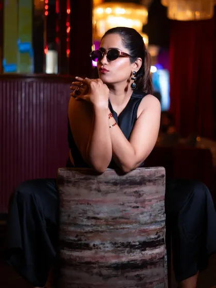 A pensive, stylish pose that adds a different mood to the series. A good lifestyle shoot should offer a range of emotions and looks.