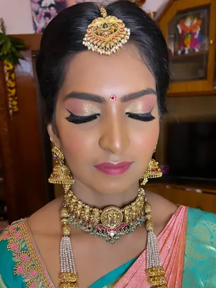 This close-up captures the flawless finish of the makeup, from the smooth base to the expertly blended eyeshadow, perfect for a memorable wedding day.
