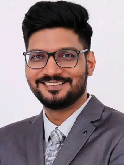 A professional headshot of myself, Dr. Abhinav Singh. I believe in building a foundation of trust and open communication with every patient who walks into SkinFine Clinic.