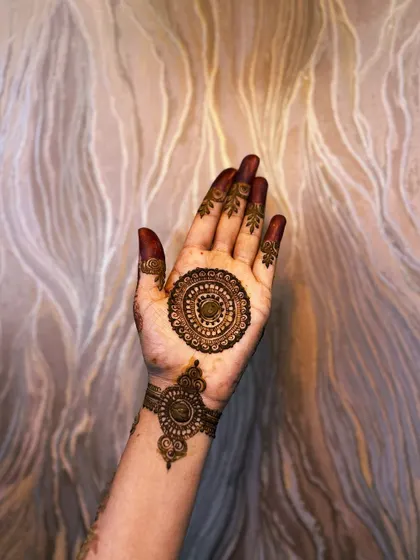 A clear, still image of a finished mandala and bracelet design. This is a timeless and elegant choice for festivals like Karva Chauth, Eid, or Diwali.