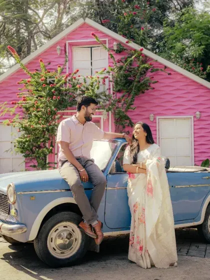 Let's have fun with your pre-wedding shoot. This couple wanted something playful and unique, so we used a vintage car and a quirky pink house as our backdrop for a memorable and colorful photo series.