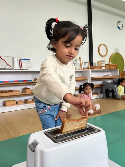 Each activity, from making Bhel Puri and toast to plucking methi leaves and exploring what floats, is a lesson in itself. These practical life and sensorial activities are central to the Montessori method, helping children develop fine motor skills, concentration, and a deep understanding of the world through their own actions.