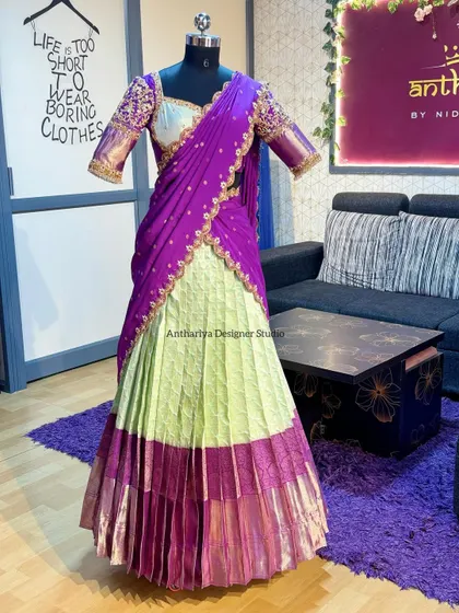 A full view of the mint green and purple langa voni, showing how the rich purple border of the original saree was used to create a beautiful contrast.
