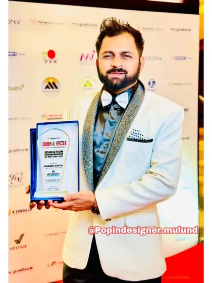 This client is accepting an award in our white tuxedo with a textured silver lapel. It’s a celebratory outfit for a celebratory moment.