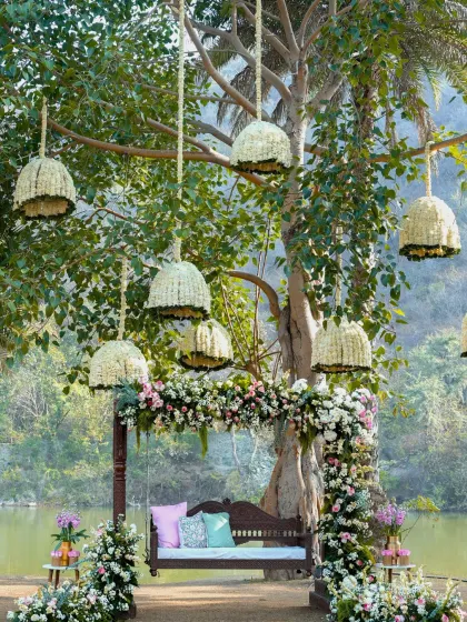 A stunning swing setup from our Udaipur wedding, featured by WeddingSutra. The design, with its hanging floral bells and lush arrangements, was celebrated for its ethereal, garden-like beauty.