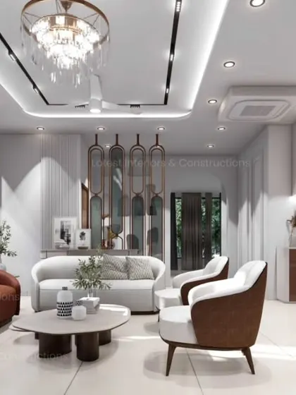 An open-concept living and dining area designed with soft curves and a warm, earthy color palette. The layout encourages conversation and flow, with a distinct yet connected bar and dining nook.