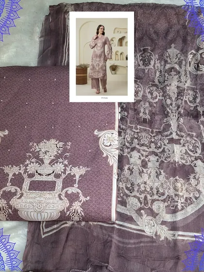 A sophisticated mauve-colored dress material with a delicate digital print. This Karachi pattern suit on muslin fabric is perfect for creating an elegant and understated outfit.