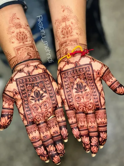 The developed stain of a traditional design featuring peacocks and lotuses. The color is bold and clear, making the intricate patterns stand out beautifully.