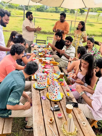 It's not just for the dogs. Pet parents get to relax and socialize too, seen here enjoying a clay-making activity during Rio's "Two Sweet" birthday celebration.
