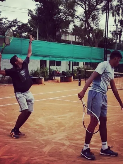 Two advanced players work on their serve and return game. This is a critical component of match play that we drill extensively.