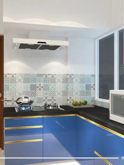Another angle of the 'Majestic Fortune' kitchen, showing the practical layout with the hob, chimney, and microwave all within easy reach. The design is both vibrant and highly functional.