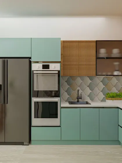 The layout includes a tall unit for the refrigerator and built-in ovens, ensuring a seamless and integrated look.
