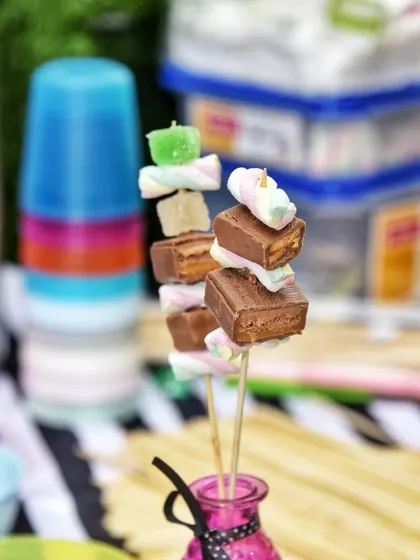 Sweet and fun treats like these marshmallow and chocolate candy skewers are always a crowd-pleaser at kids' parties.