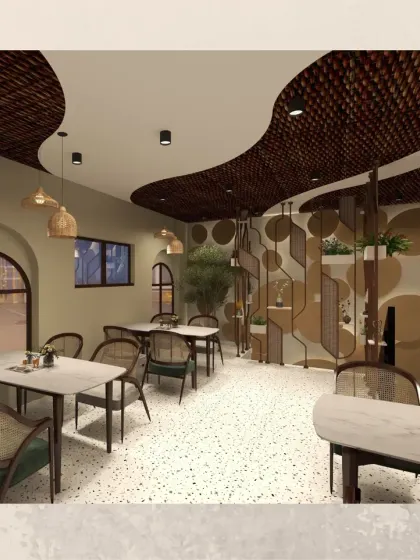 An overall view of the dining space, showing the interplay of different seating arrangements, from tables for four to smaller setups. The layout is designed to accommodate various group sizes while maintaining a comfortable flow.