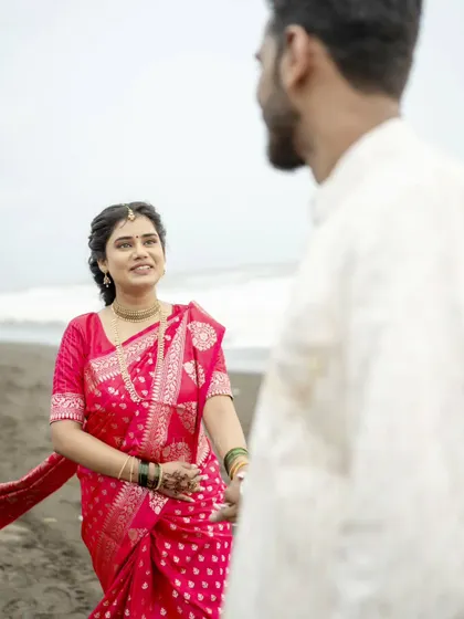 A look of love and trust. This over-the-shoulder shot creates a sense of intimacy and connection in this pre-wedding photo.