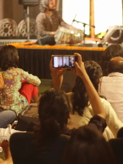 The audience is as much a part of the performance as the artists. Here, you can see listeners capturing the moment, fully engaged in a thumri and dadra recital.