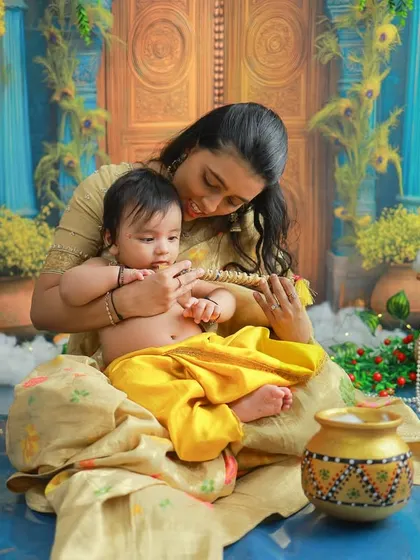 A tender moment between a mother and her little Kanha. These quiet, loving interactions are just as important to capture as the playful ones.