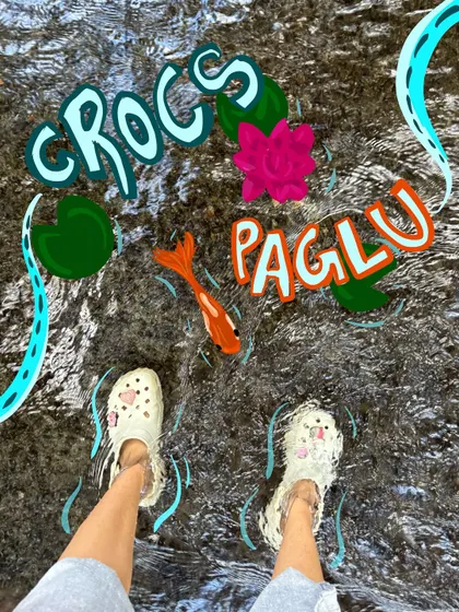 Crocs paglu. A quirky photo of my feet in a stream, with some fun, crazy doodles to match the "paglu" vibe.