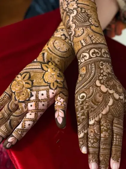 A close-up of a heavy bridal design, combining bold floral work with fine, detailed check patterns for a stunning contrast.